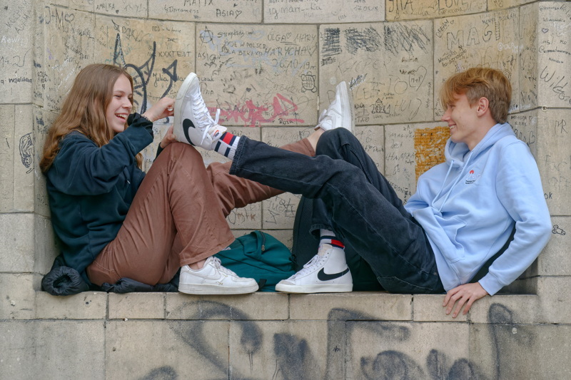 Young happy couple amusing